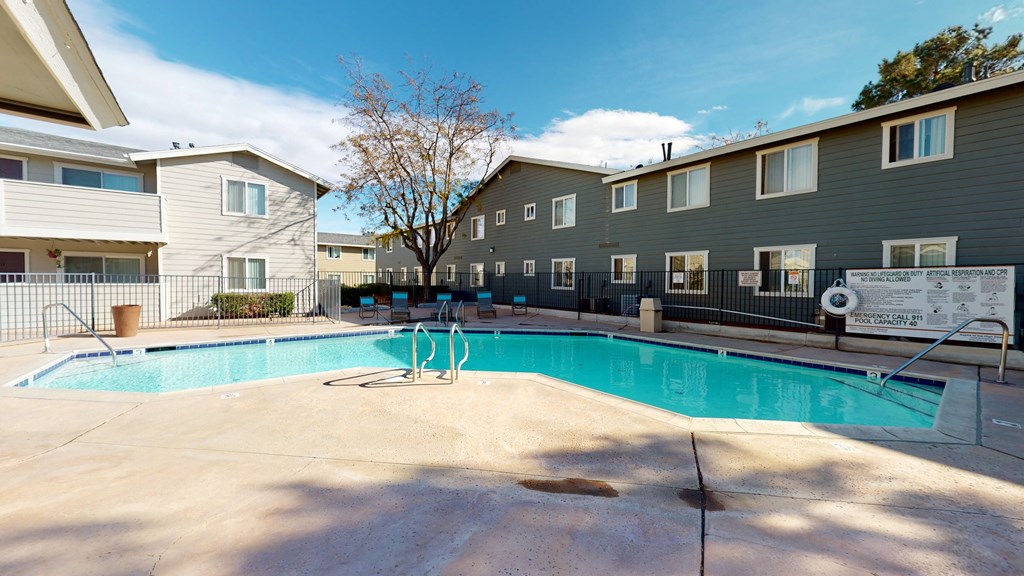 Aspire of the High Desert - Sparkling Pool Surrounded by Lounge Seating at Aspire High Desert Apartments, Victorville, CA