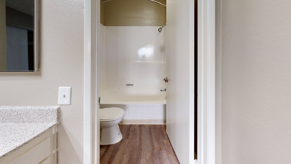 Bathroom with a Shower Tub combo, Wood-Style Flooring, and Granite Style Vanity at Avante Apartments, California, 91764