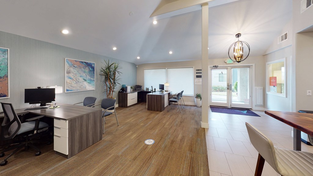 Business Center with Desks, Plenty of Seating, and Desktop Computers at Avante Apartments, Ontario, California