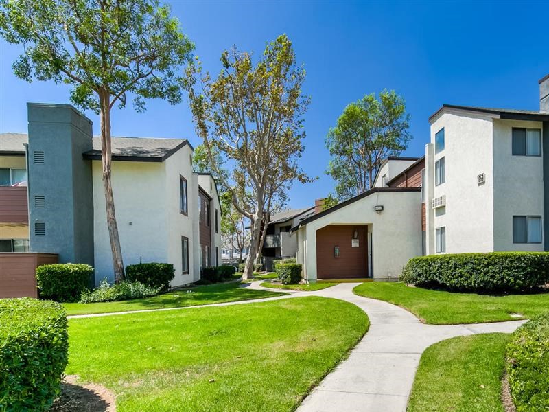 Apartments for Rent in Ontario - Walkway through Avante Apartment Buildings Surrounded by Lush Landscaping - Photo Gallery
