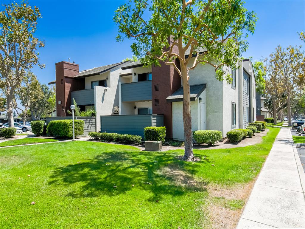  Walkway through Avante Apartment Buildings Surrounded by Lush Landscaping at Avante Apartments, Ontario, California