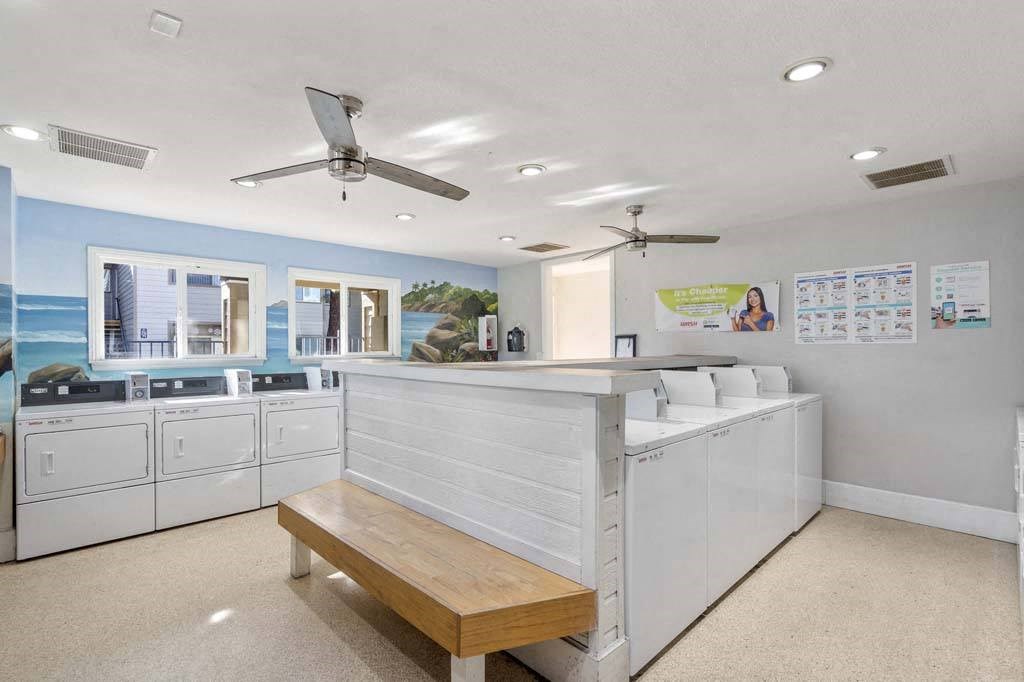 a kitchen or kitchenette at lighthouse look apartments at Aspire Rialto, California