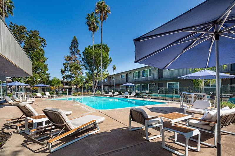 Pool with lounge chairs  at Aspire Sacramento Apartments, Sacramento, California
