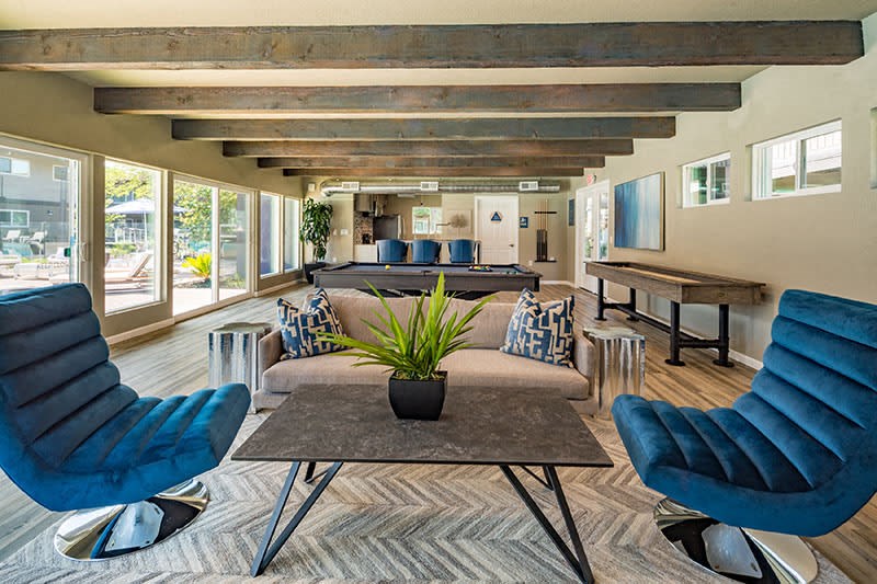 Apartments for Rent in East Sacramento- Aspire Sacramento- Billiards Table with Seating Area and Floor-to-Ceiling Windows at Aspire Sacramento Apartments, California, 95825