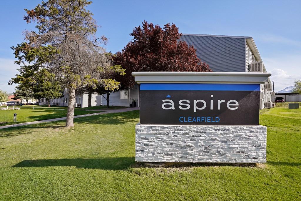 a sign for aspire clearfield in front of a building