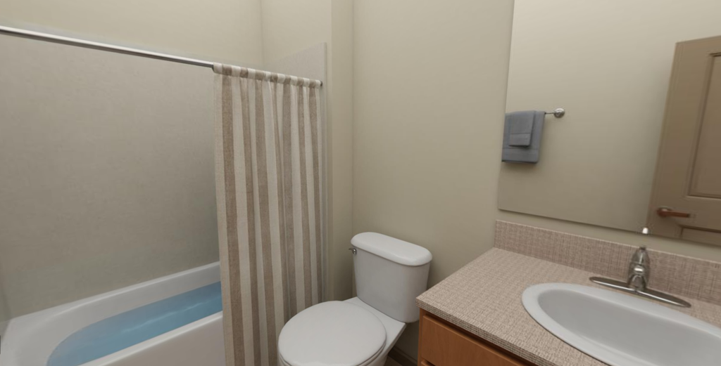 a bathroom with a toilet sink and bathtub