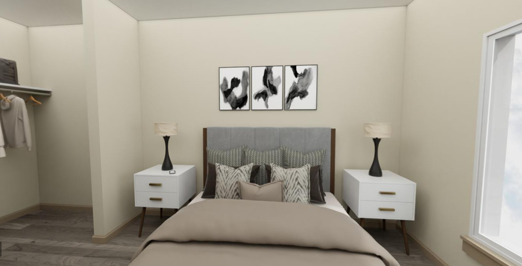 a bedroom with a bed and two night stands