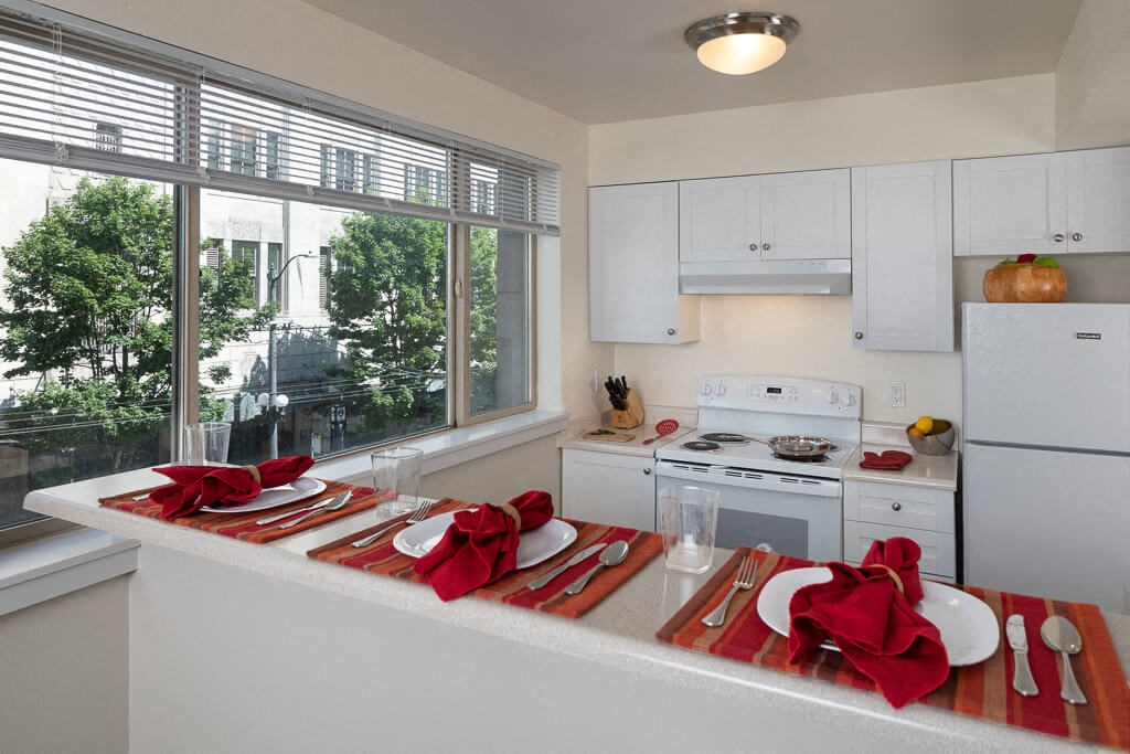 Kitchen and dining at Gilmore Apartments, Seattle, WA, 98101