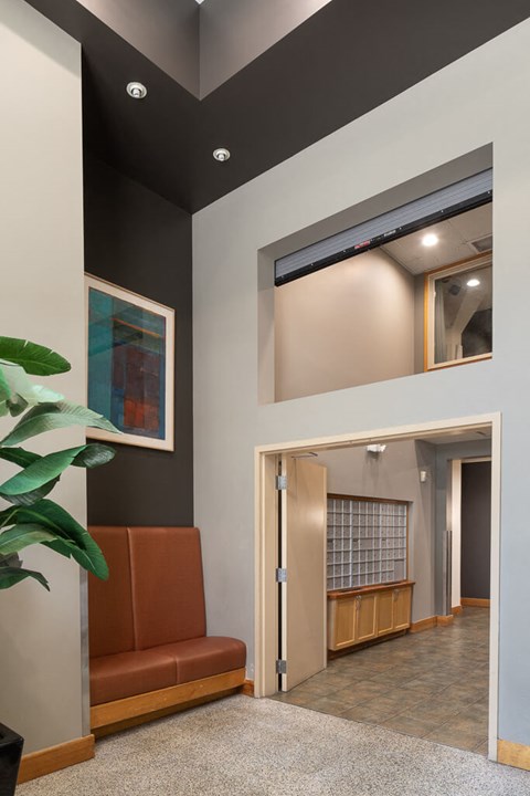 a living room with a couch and a window