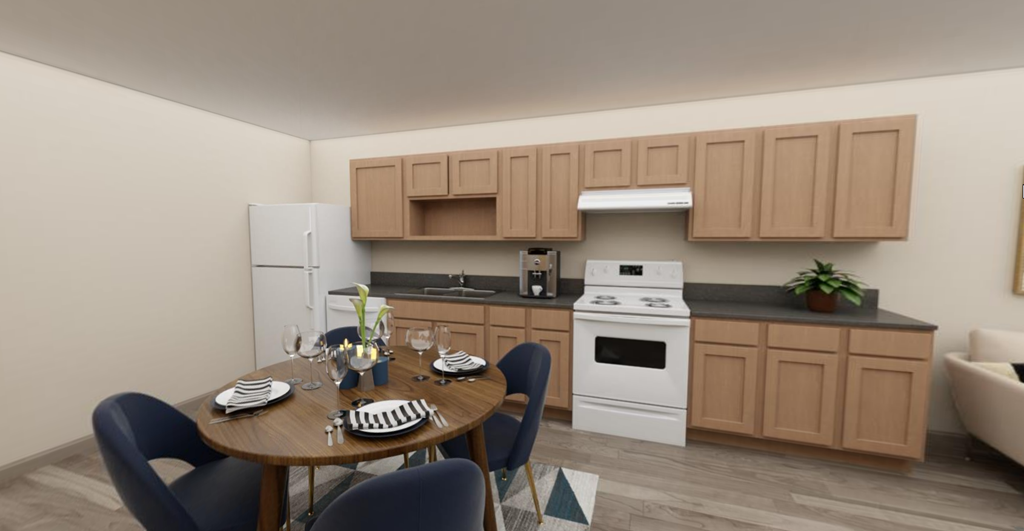 a kitchen and dining room with a table and chairs