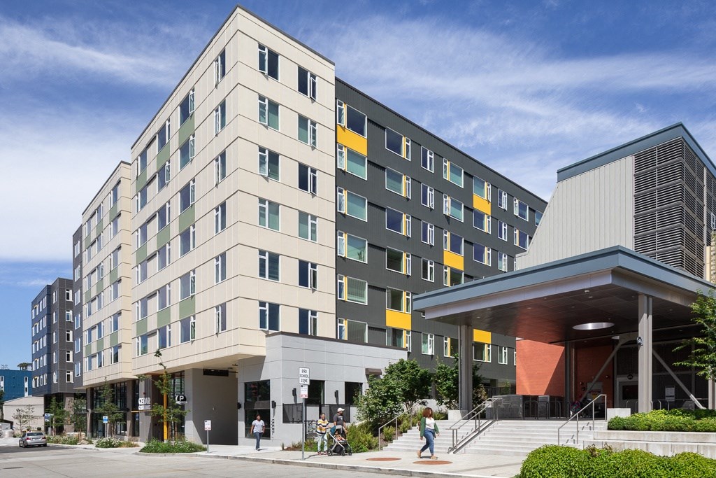 a large building with a street in front of it