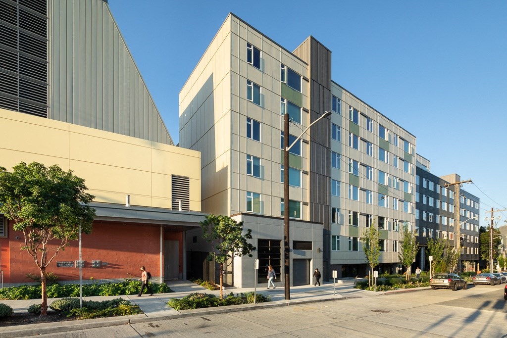a large building with a street in front of it