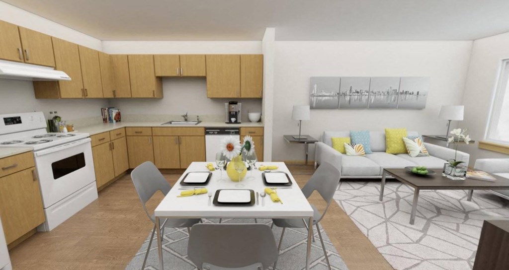 A modern kitchen with a dining table set for two.