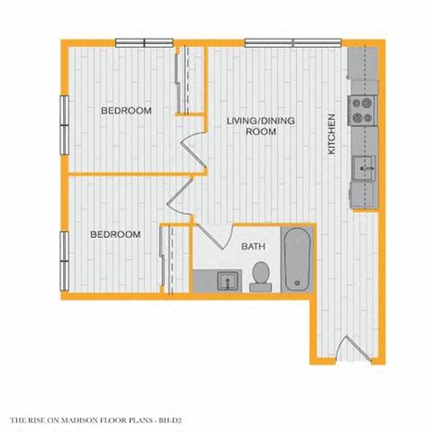 A floor plan of a Madison floor plan with two bedrooms, a living/dining room, a kitchen, and a bath.