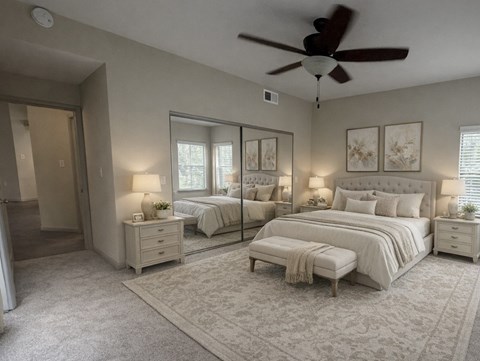 A bedroom with two beds, a dresser, and a ceiling fan.