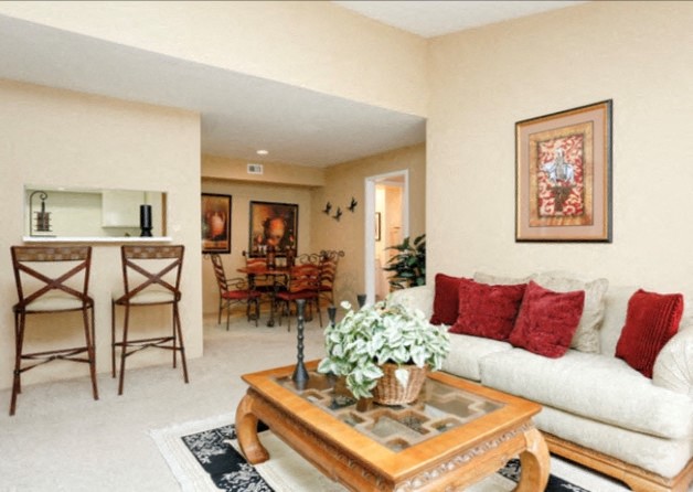 a living room with a couch and a coffee table