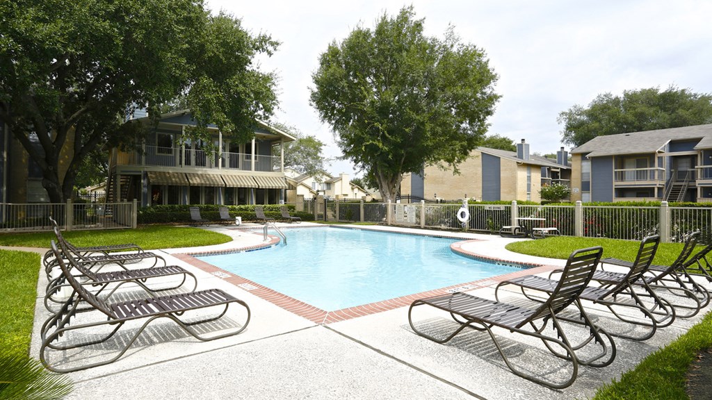 our apartments have a large pool and lounge chairs