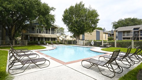 our apartments have a large pool and lounge chairs