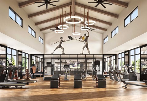A gym with a variety of equipment and a large window.