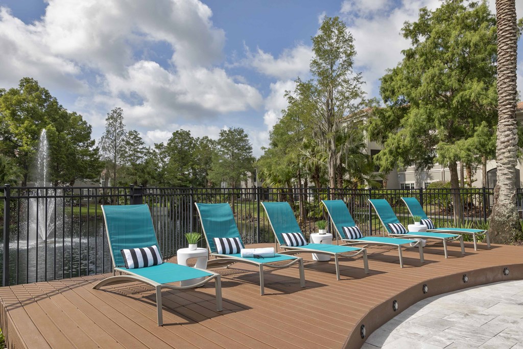 Sanford Lake's Edge Apartments poolside lounge chairs