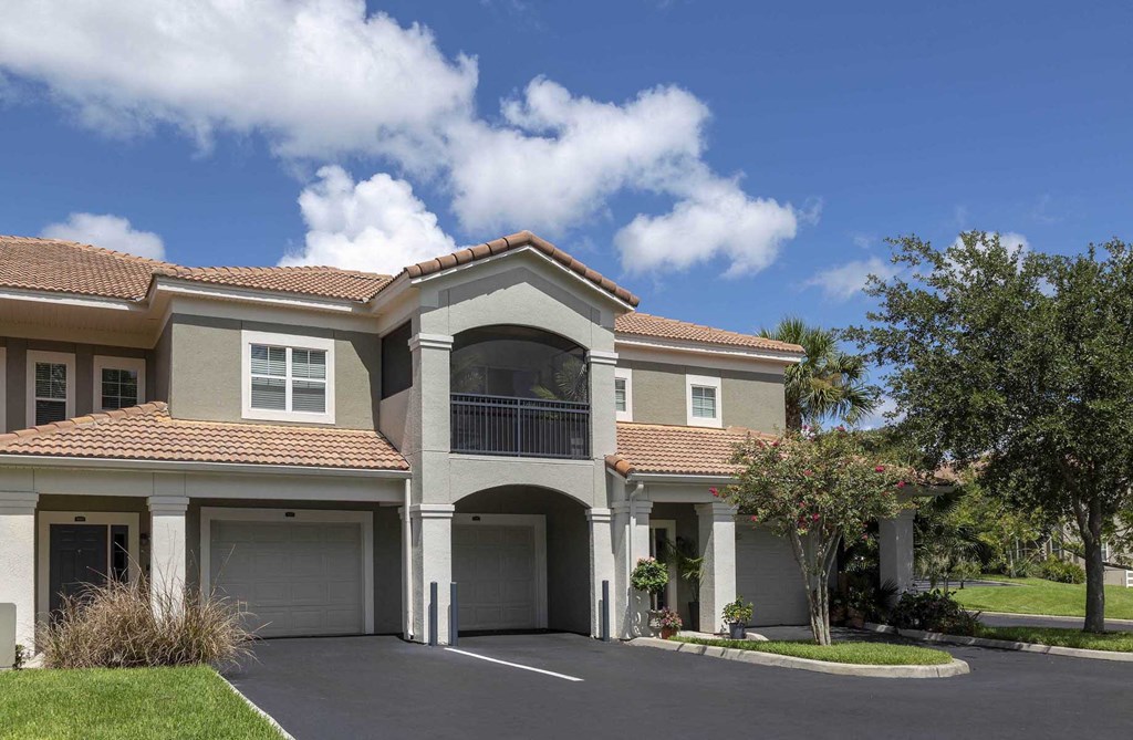 Sanford Lake's Edge Apartments exterior with convenient parking and private garages