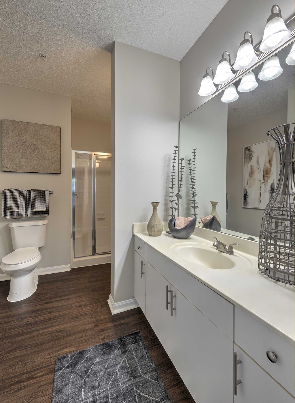 Sanford Lake's Edge Apartments spacious bathroom with large vanity and walk-in shower