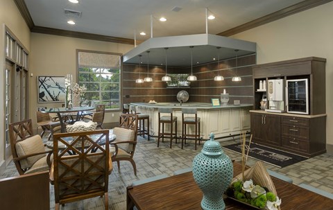 a large kitchen and dining room with a table and chairs
