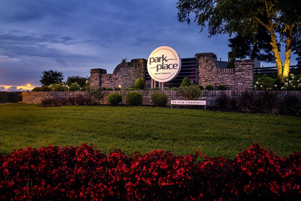 Lexington Park Place Apartments community entrance sign at dusk