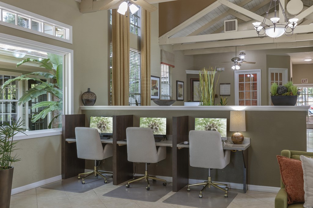 Longwood Sabal Park Apartments business center with personal workspaces