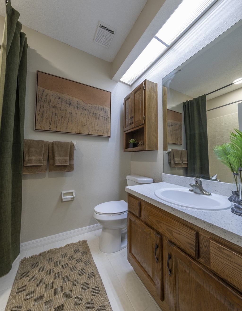 Longwood Sabal Park Apartments secondary bathroom with solid-oak vanity