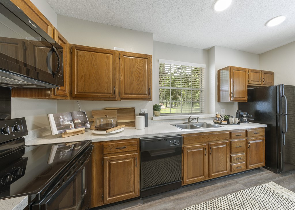 Longwood Sabal Park Apartments kitchen with solid-oak cabinetry