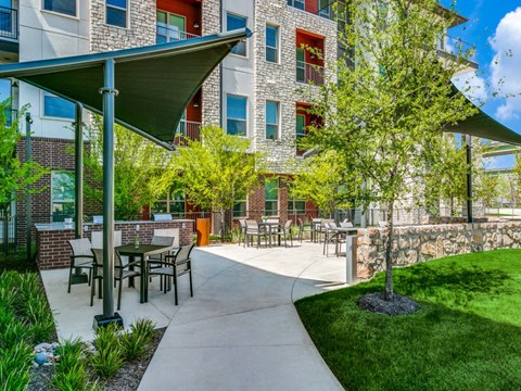 Sagemont Apartments Irving Texas outdoor grills and dining patio