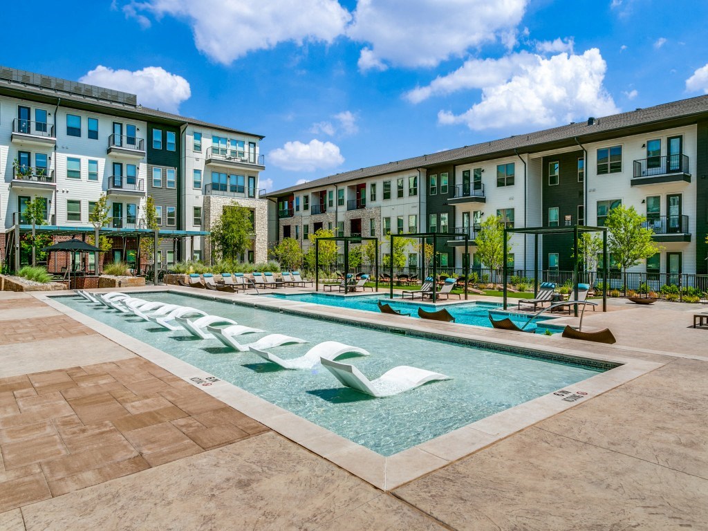 Sagemont Apartments Irving Texas resort-style pool with Baha shelf
