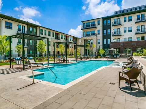 Sagemont Apartments Irving Texas resort-style swimming pool with expansive sundeck