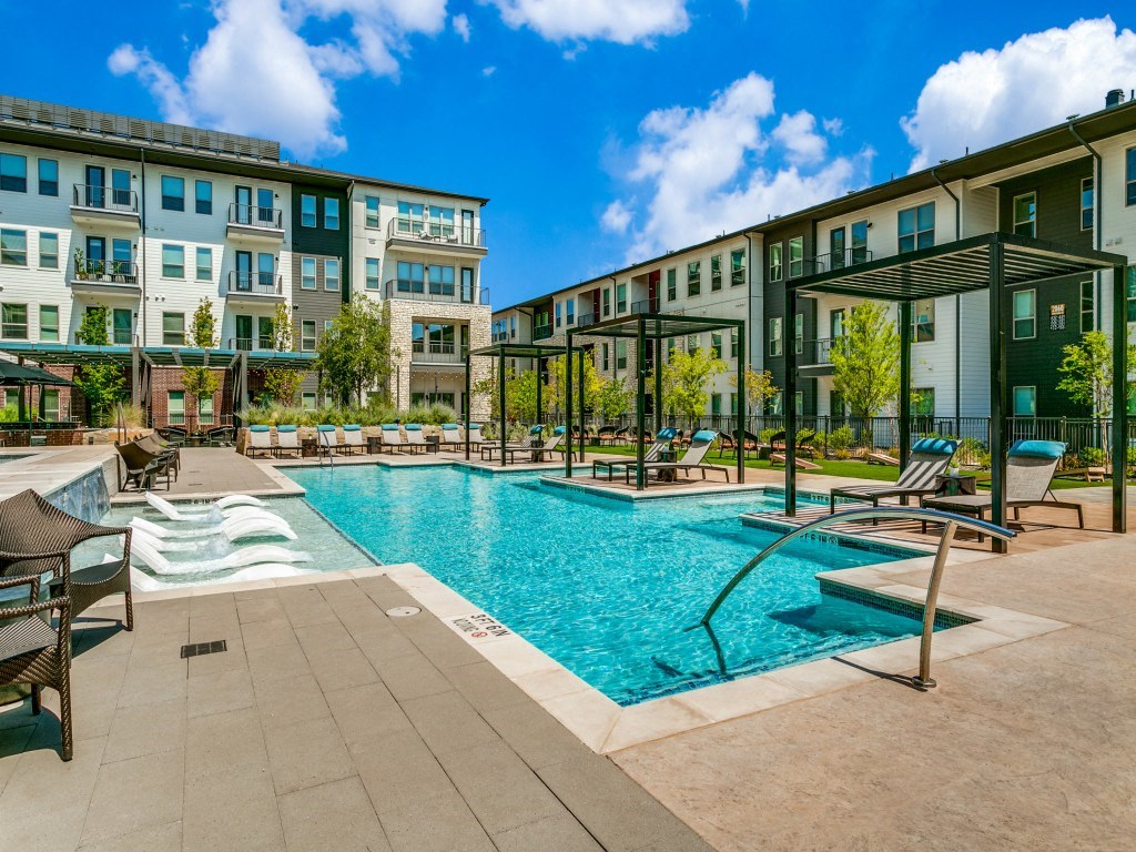 Sagemont Apartments Irving Texas resort-style swimming pool with expansive sundeck