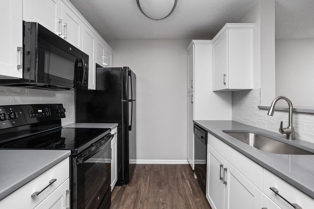 Indianapolis The Lakes Apartments updated kitchen with white cabinets