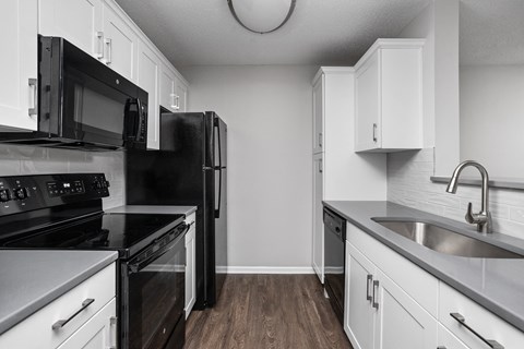 Indianapolis The Lakes Apartments updated kitchen with white cabinets