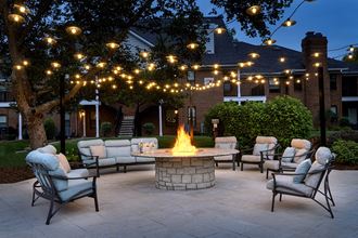 The Willows Apartments Louisville cozy outdoor firepit with lounge seating