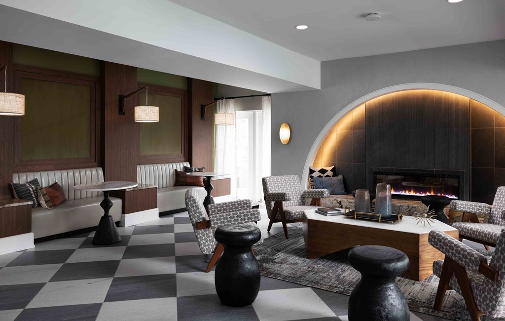 Hurstbourne Grand Apartments Louisville resident lounge with fireplace and modern decor