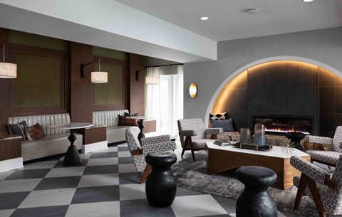 Hurstbourne Grand Apartments Louisville resident lounge with fireplace and modern decor
