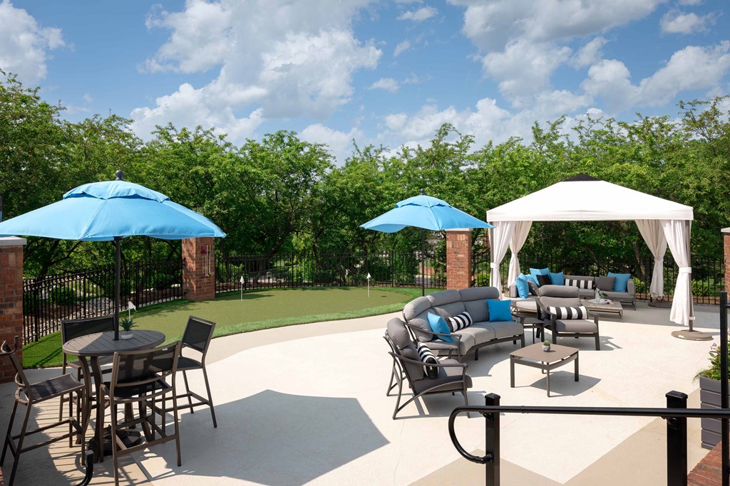 The Overlook at St. Thomas Apartments Louisville putting green and cabana