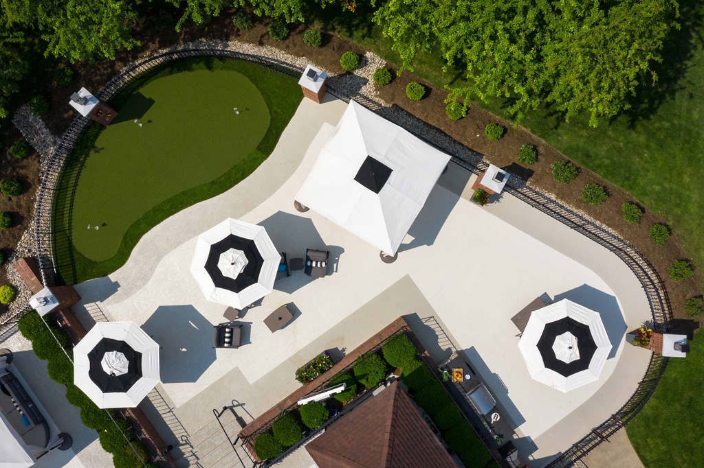 The Overlook at St. Thomas Apartments Louisville aerial view of putting green and cabanas