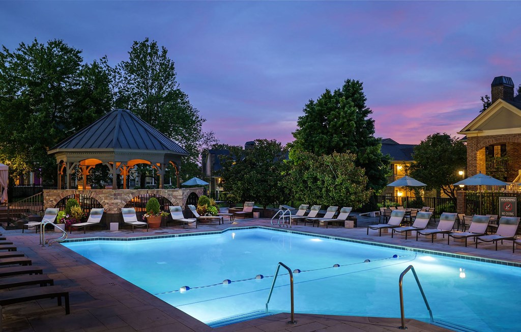 Lexington Park Place Apartments resort-style pool at dusk Lexington Park Place Apartments resort-style pool at dusk