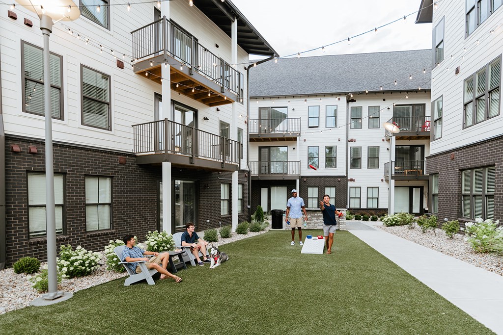 Upton Oxmoor Apartments Louisville outdoor courtyard with cornhole