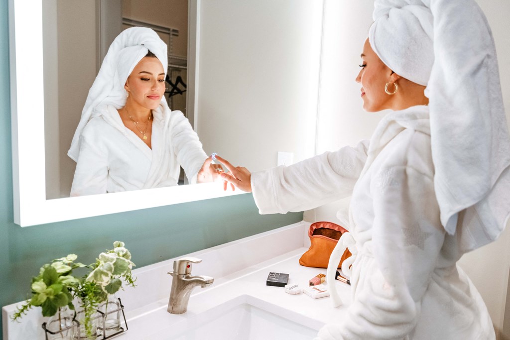 Upton Oxmoor Apartments Louisville bathroom vanity with lighted mirror