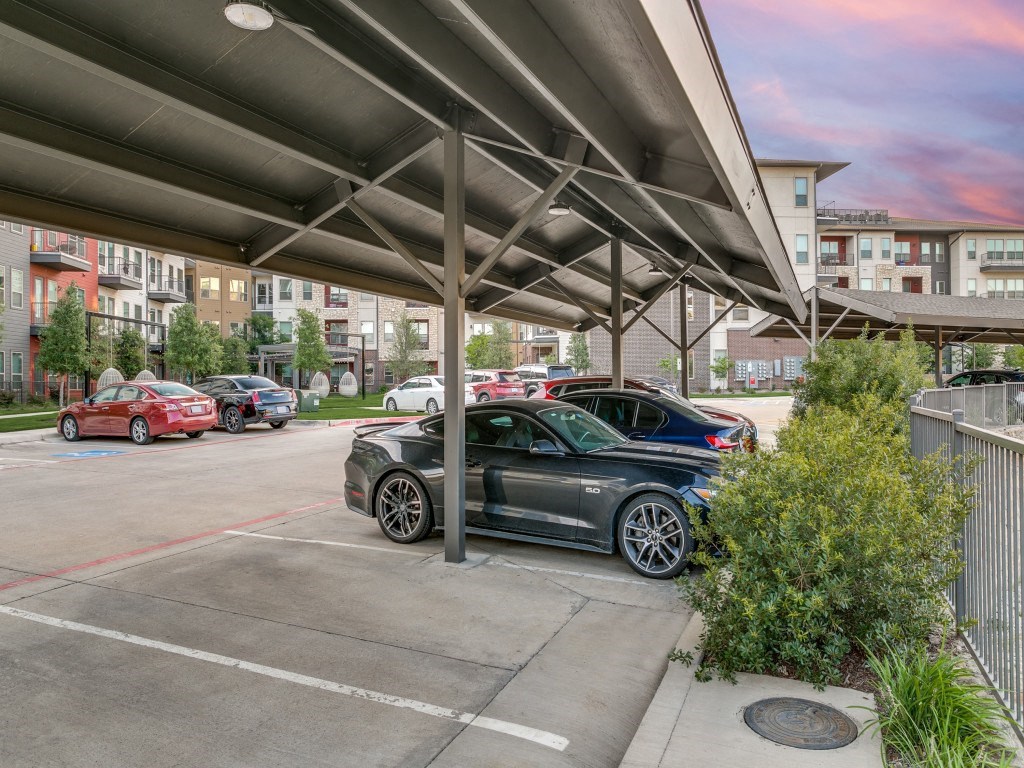 a parking lot with cars parked in it