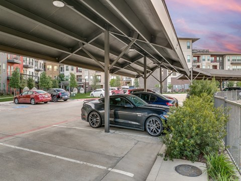 a parking lot with cars parked in it