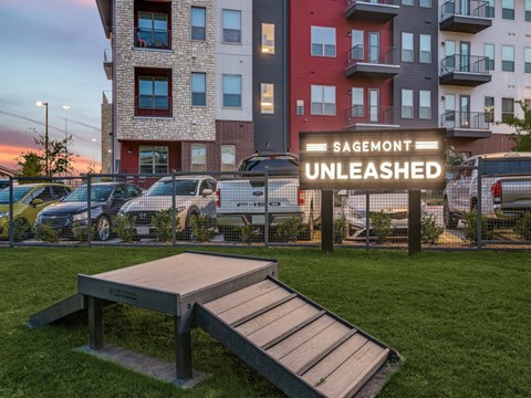a picnic bench in front of an apartment building