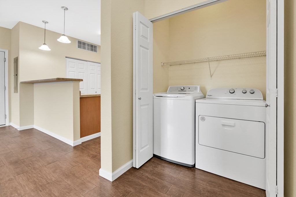 A laundry room with a washer and dryer.