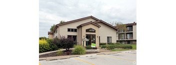 A building with a brown roof and a sign that says "1500" on it.